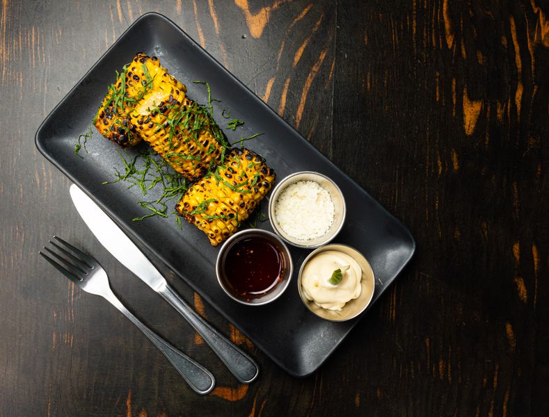 Grilled Corn on the Cob with herb butter and parmesan
